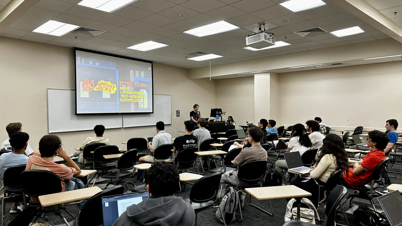 Michael leading a technical workshop for students
